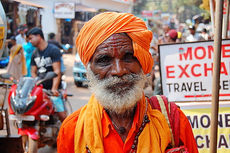 shallow focus photography of woman in orange collared top thumbnail