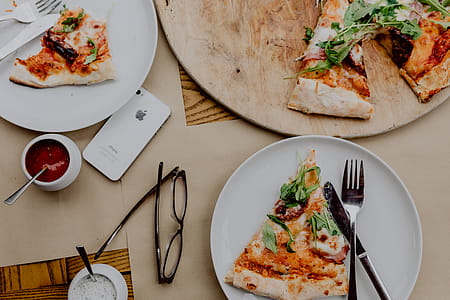 Eating delicious pizza in a cozy restaurant thumbnail