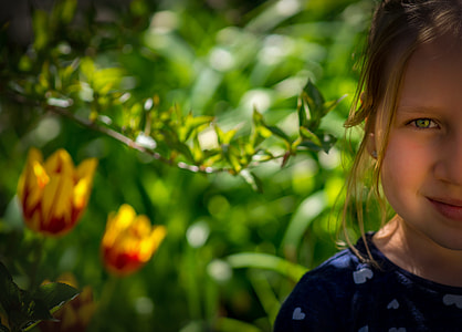 girl wearing blue top selective focus photography thumbnail
