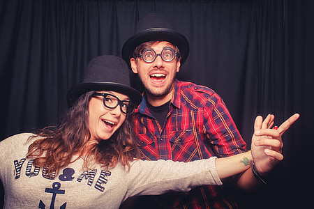 man and woman wearing black hat thumbnail
