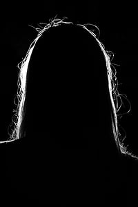 silhouette photo of long-haired person thumbnail