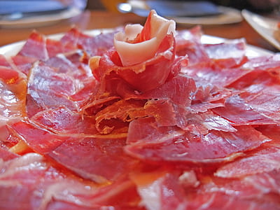 sliced bacon served on plate thumbnail