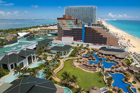 aerial photography of pool and beach resort thumbnail