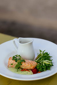 Salmon With Green Vegetable Toppings On White Ceramic Plate thumbnail