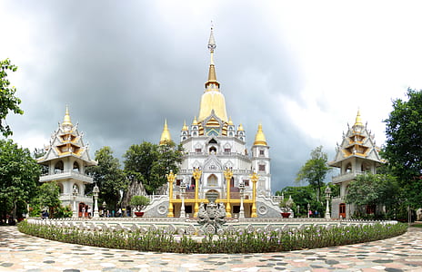 yellow and gray concrete temple with towers thumbnail