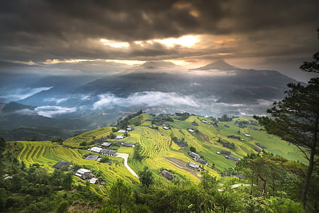 aerial photography of village on mountain thumbnail