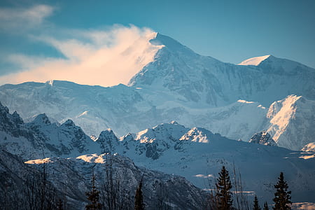 mountain covered with snow at daytime thumbnail