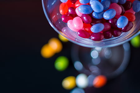 Selective Focus Photography of Jelly Beans on Jar thumbnail