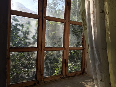 closed brown wooden window thumbnail