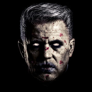 man's face with spill of blood digital wallpaper thumbnail