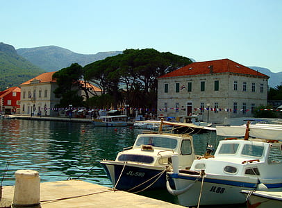 bowrider boat near buildings thumbnail