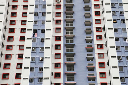 gray and white concrete high-rise building at daytime thumbnail