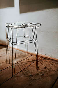 Various designer chairs and tables on an exhibition thumbnail