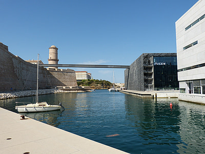 boat dock near buildings thumbnail