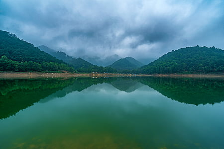 mountain near body of water view thumbnail