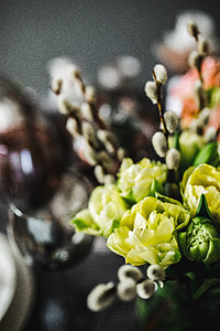 Round dinner table decorated with easter motifs thumbnail