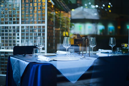 clear wine glasses on table thumbnail