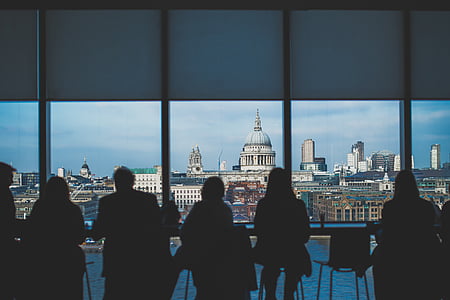 silhouette of people sitting near window thumbnail