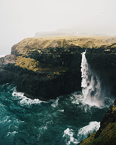 photo of waterfalls and brown rocks thumbnail