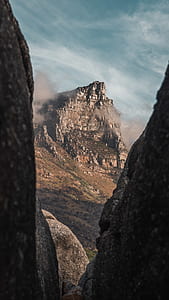 rock formation covered with mist thumbnail