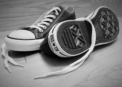 grayscale photography of Converse low-top sneakers thumbnail