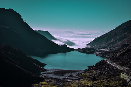 lake surrounded by three mountains thumbnail
