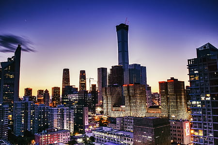 buildings under clear blue sky thumbnail