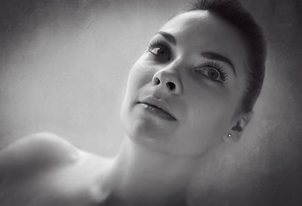 grayscale photograph of topless woman thumbnail