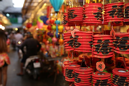 red and black Chinese lanterns selective focus photography thumbnail