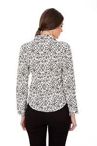 photo of woman standing wearing long-sleeved shirt and black bottoms thumbnail