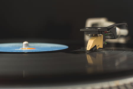 selective focus photography of turntable thumbnail