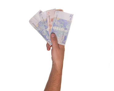 person holding four banknotes thumbnail