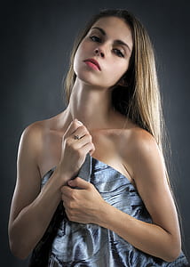 woman wearing gray strapless top thumbnail