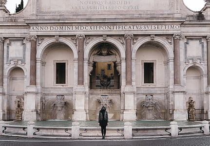 person standing in front of Anno Domini MDC building thumbnail