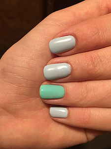 three white and one green nail art thumbnail