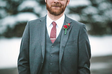 man wearing suit during winter thumbnail