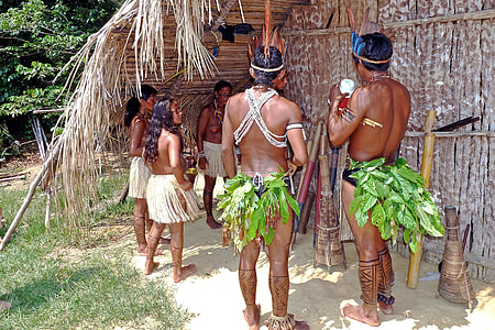 man and woman in a native costume thumbnail
