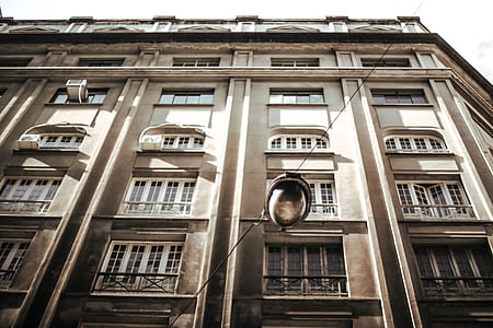white and brown concrete building at daytime thumbnail