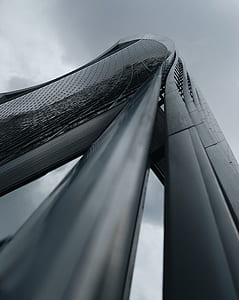 low-angle photography of glass window building thumbnail