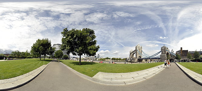 two people walking on park during daytime thumbnail