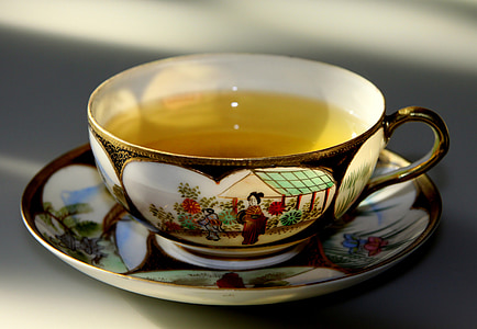 teal in tea cup thumbnail