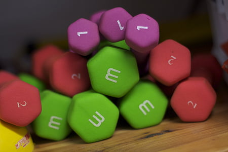 close-up photo of assorted-color dumbbells thumbnail