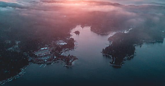 aerial photo of village near body of water thumbnail