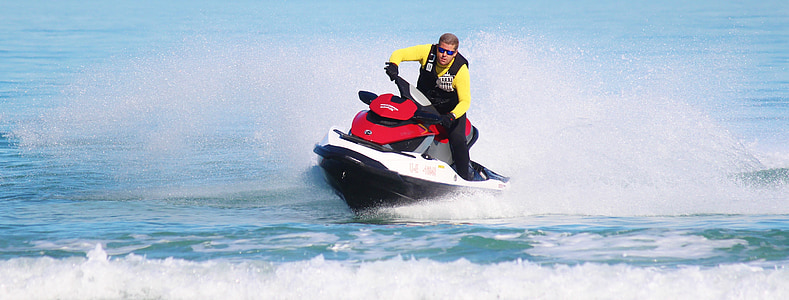 man riding on personal watercraft thumbnail