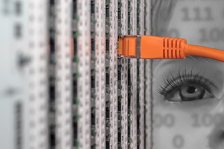 selective color photo of plugged-in orange modem cable thumbnail
