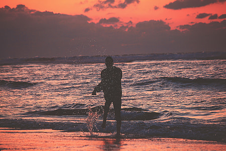 person standing at seashore thumbnail