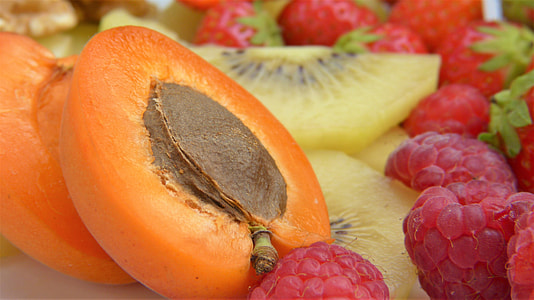 sliced kiwi and tomato fruits thumbnail
