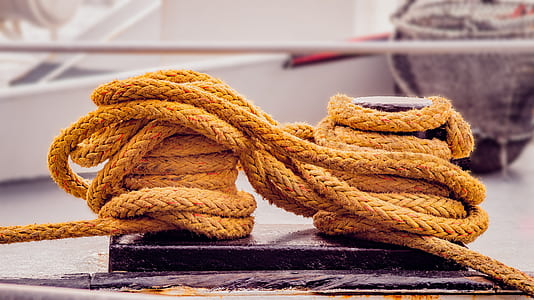 brown rope wrapped around metal frame thumbnail