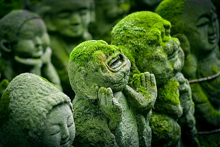 human concrete statue with moss thumbnail