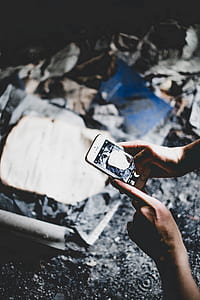 person holding silver iPhone 5s thumbnail